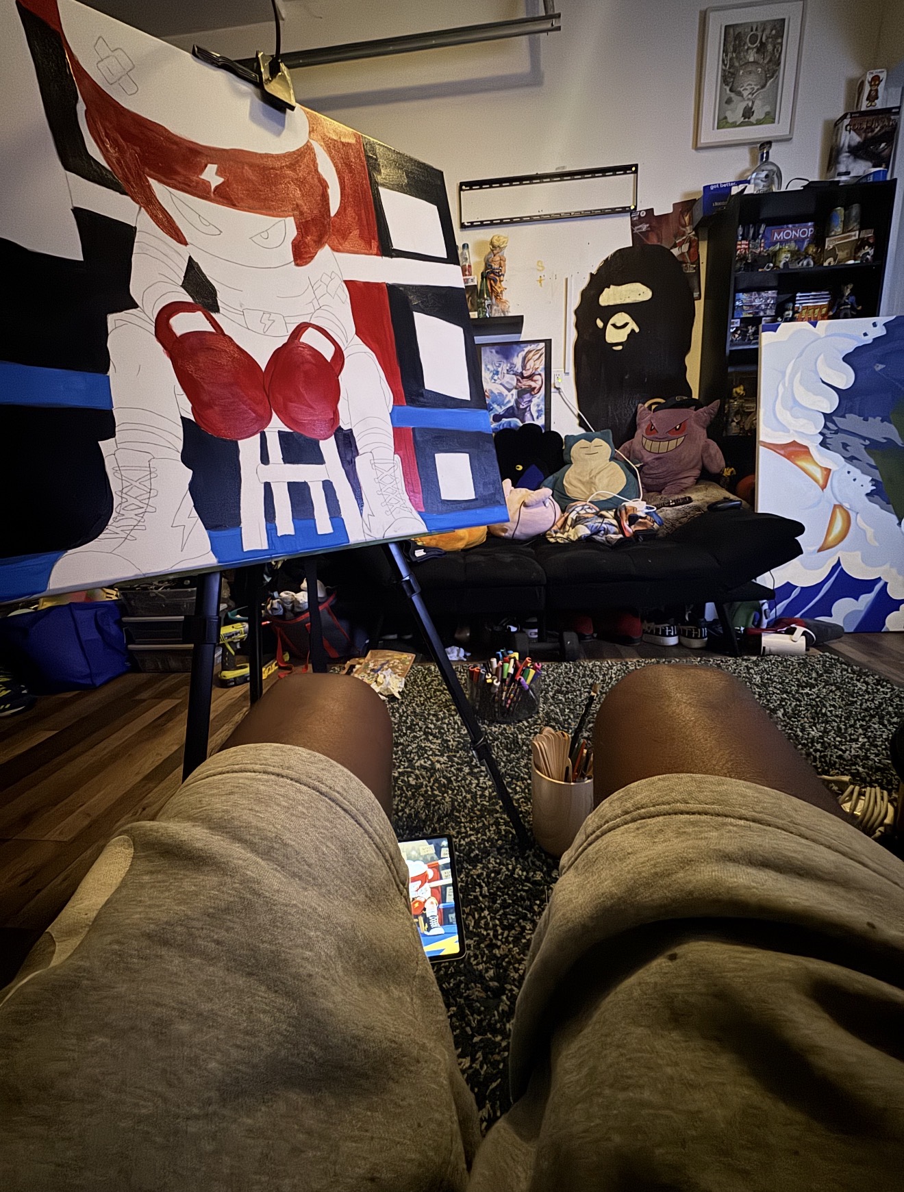 Yak Jr’s studio painting of an illustrated boxer in red gloves and headgear